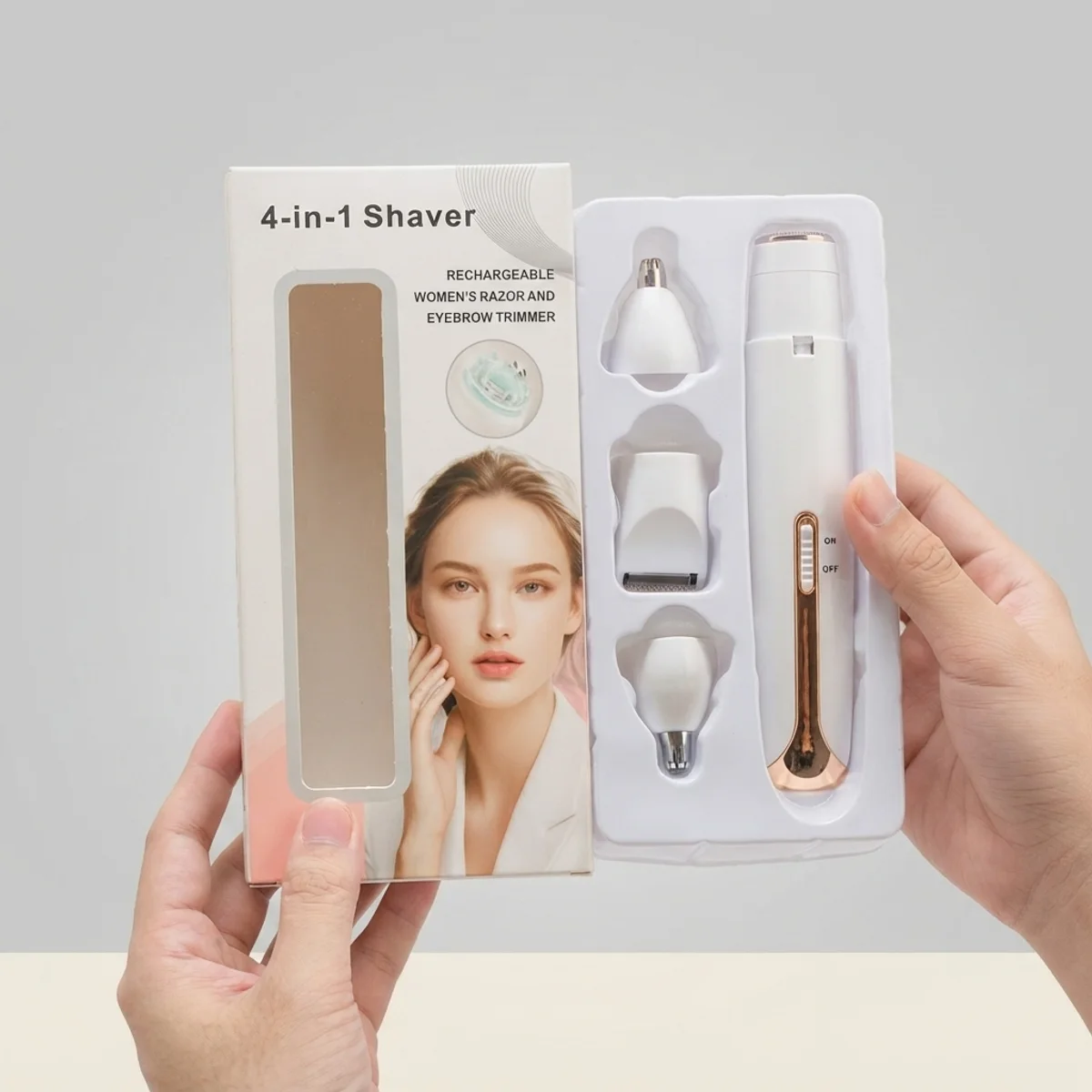 4 in 1 rechargeable hair remover kit with four heads in its box